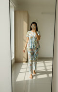 Front view of model in premium cotton nightwear, redefining everyday luxury